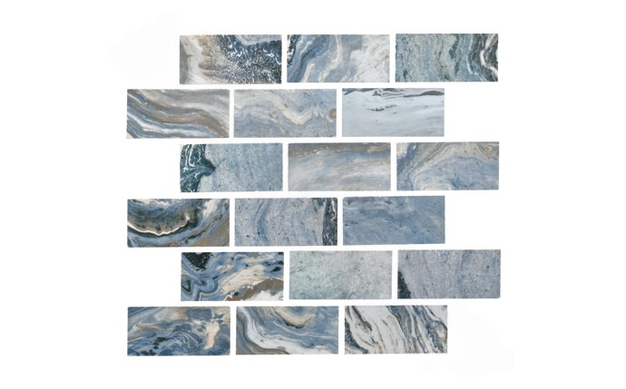 Closeup of marbleized light blue onyx pool tile