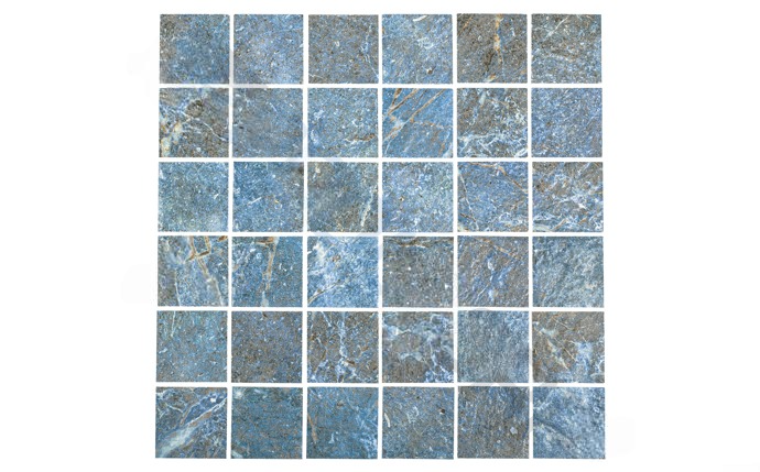 Close-up of 2" x 2" multicolor safari tile with natural stone texture