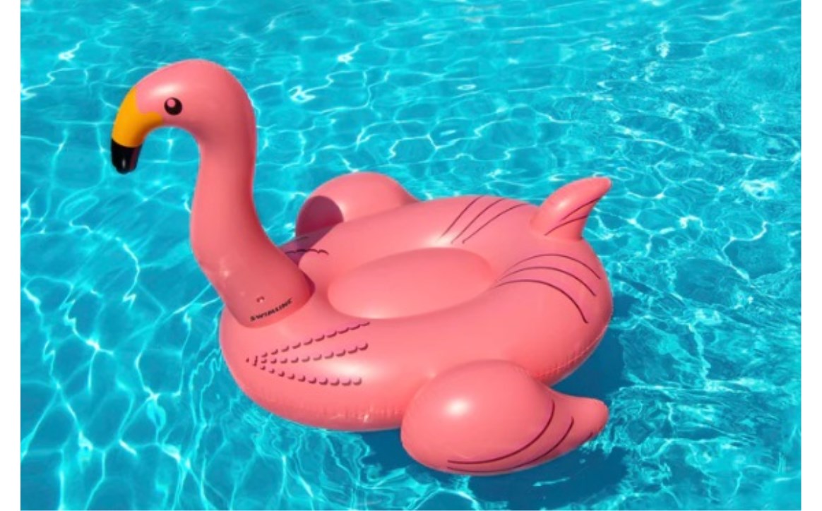 Swimline® 90627 Giant Flamingo Ride-On Float in a pool setting