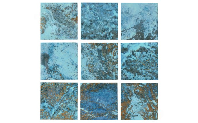 Glossy shine of Sargasso Aqua tile poolside