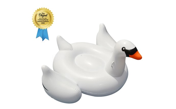 Swimline Original Giant Swan Ride-On Float 66" in a pool