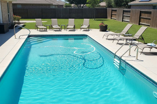 well-maintained chlorinated swimming pool in a suburban backyard