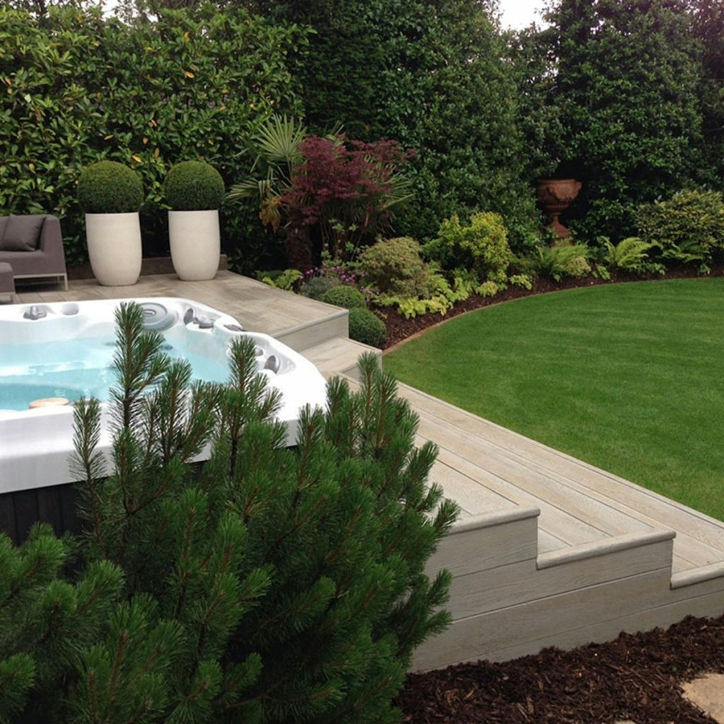 Outdoor hot tub on a backyard deck