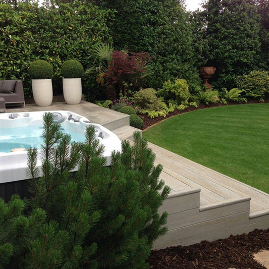 Outdoor hot tub on a backyard deck