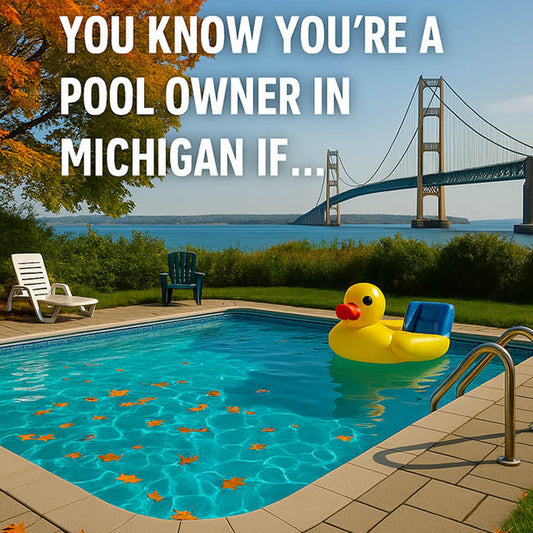 Swimming pool in Michigan with a bridge behind it.
