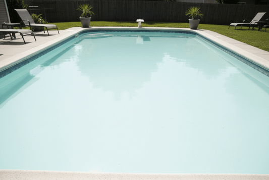 Backyard swimming pool with cloudy water after shocking treatment