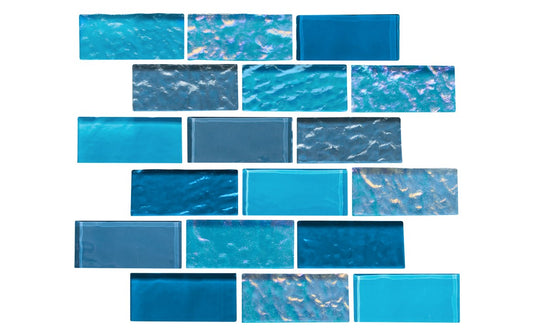 Peacock glass tile used in pool waterline design