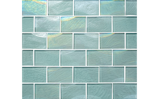 Close-up of NPT 2x3 Sea Ice Tile in Icecap showcasing translucent ice-white hue and iridescence.