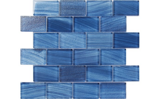 Stardust Cobalt Glass Tile installed in a pool, showcasing its shimmering blue finish.