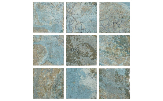 Close-up of NPT Isola Elba 2x2 mosaic pool tile showing green and blue shades