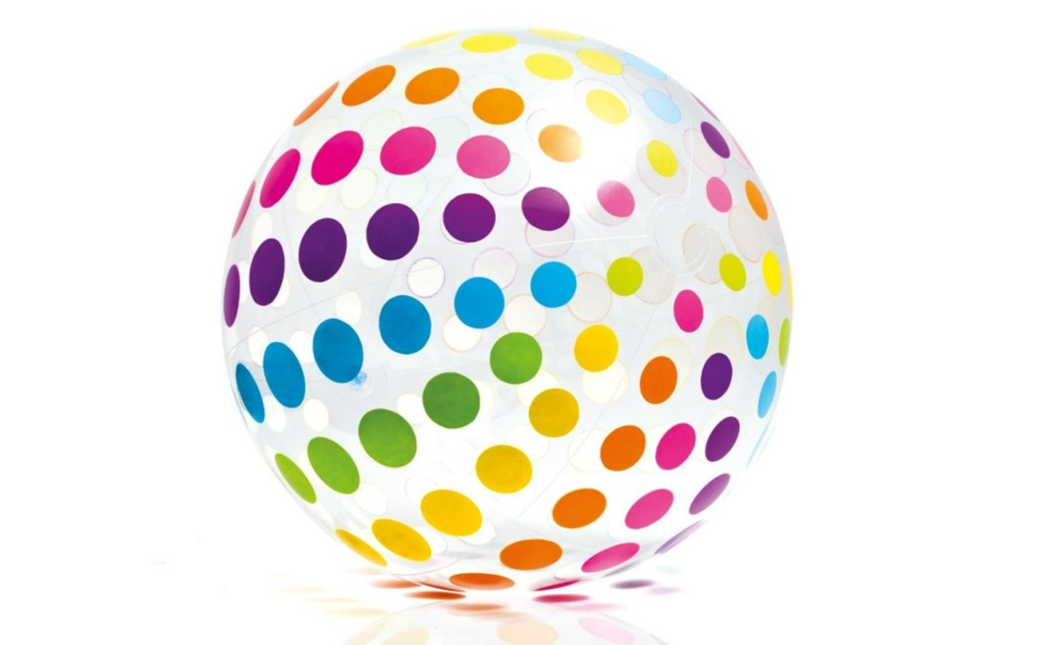 Inflated jumbo beach ball floating in a pool