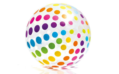 Inflated jumbo beach ball floating in a pool